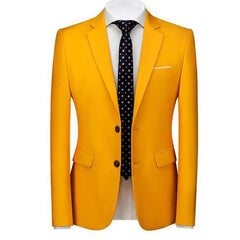 A slim fit yellow single-breasted blazer with a notch lapel worn with a white shirt and dark tie.