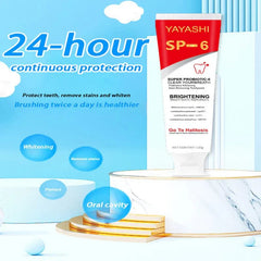 A tube of Yayashi SP-6 probiotic whitening toothpaste stands on a white display platform.