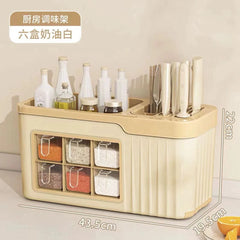 A cream-colored kitchen storage rack with six spice compartments, a knife block, and space for bottles.