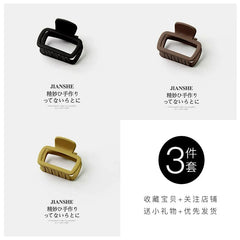 Three square matte hair claw clips in black, brown, and olive green colors.
