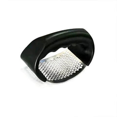 A stainless steel garlic press with a curved metal grating surface and a black plastic handle.