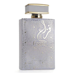 A rectangular light purple perfume bottle with gold filigree patterns and a matching cap.