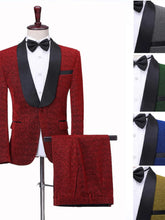 A red single-breasted tuxedo with a black shawl collar and matching trousers.