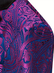 A close-up of a men's blazer featuring a vibrant blue and magenta paisley pattern.