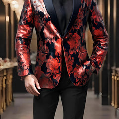 A men's single-button blazer featuring a red and black floral pattern with a notched lapel.