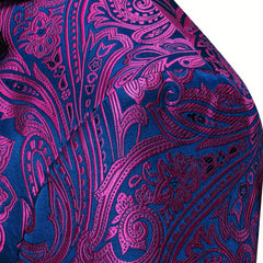 A close-up of a men's suit jacket featuring a vibrant blue and magenta paisley pattern.