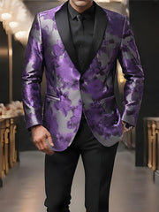 A man wears a purple floral patterned blazer with a black notched lapel and black trousers.