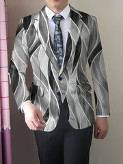 A man wears a slim fit blazer featuring a black and white abstract wave pattern.