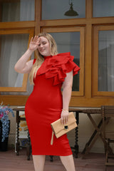 A woman wears a red, sleeveless, high-neck bodycon midi dress featuring a large shoulder ruffle.