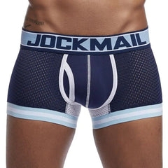 A pair of navy blue mesh boxer briefs with a light blue waistband featuring the JOCKMAIL logo.