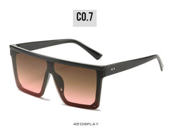 One-piece square sunglasses with a black frame and gradient pink lenses.