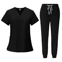 A black V-neck scrub top and matching jogger-style pants with a drawstring waist.