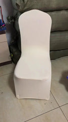 A plain white, one-piece stretch chair cover designed for banquet and hotel seating.