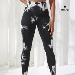 High-waisted black and white tie-dye seamless leggings with a ribbed texture.