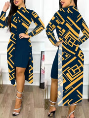 A woman wears a two-piece set featuring a solid navy mini dress and a long-sleeved printed cardigan.