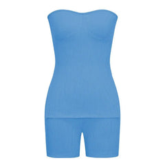 A bright blue strapless ribbed knit top and matching shorts set.