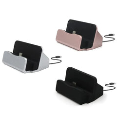 Three USB-C charging dock stations in silver, rose gold, and black on a white background.