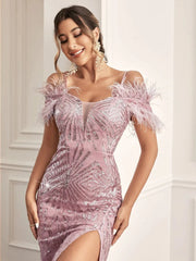 A mauve floor-length sequin formal dress with a sweetheart neckline, spaghetti straps, and feathers.