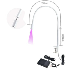A white UV curing lamp with a flexible neck, desk clamp, and foot pedal switch.