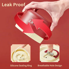 A red thermal lunch box with a silicone sealing ring and a breathable hole design on the lid.