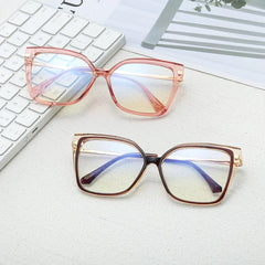 Two pairs of stylish square-framed glasses with transparent anti-blue light lenses.