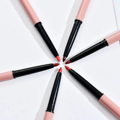Six lip liner pencils with black barrels and light pink caps arranged in a circle.