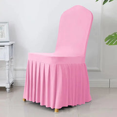 A pink stretch spandex chair cover featuring a pleated skirt design.