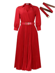 A long-sleeved red pleated midi dress with a V-neckline and a matching belt.