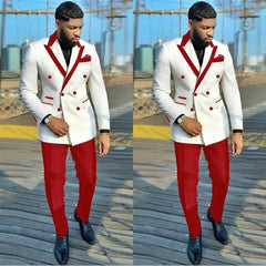 A man wears a white double-breasted suit jacket with red peaked lapels and matching red trousers.