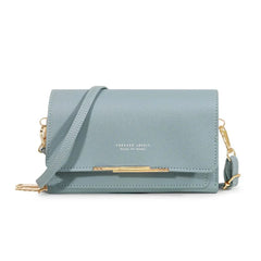 A light blue rectangular shoulder bag with a gold metal accent and a detachable strap.