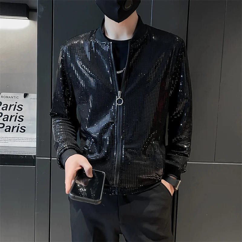 A man wears a black sequined bomber jacket with a stand collar and ribbed cuffs.