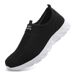 A black slip-on mesh sneaker with a white rubber sole and a small Sport Fashion label.