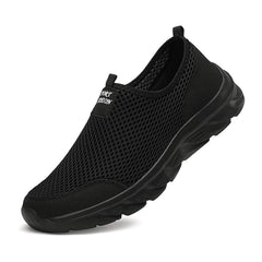 A black slip-on sneaker with a breathable mesh upper and a lightweight rubber sole.