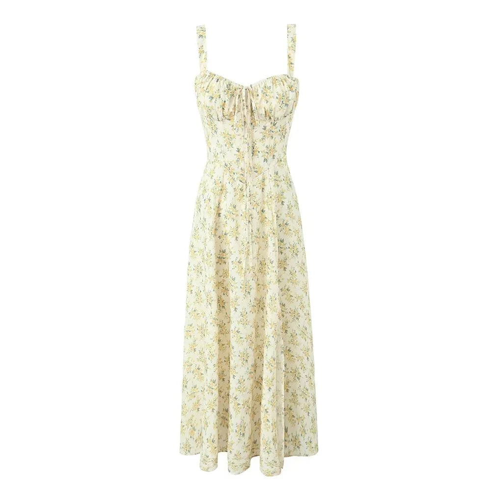 A cream-colored midi dress with a yellow floral print, square neckline, and spaghetti straps.