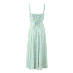A light blue midi dress with a yellow floral print, square neckline, and lace-up back detail.
