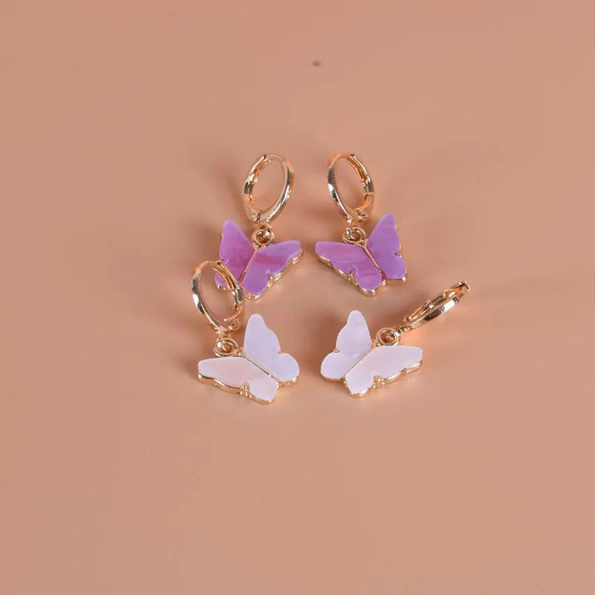 Pink butterfly pendant earrings by Showlu Fashion, alloy jewelry ear clips with a natural, elegant butterfly design.