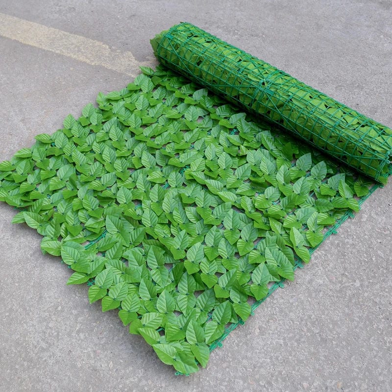 Showlu artificial leaf privacy fence roll, UV protected garden screen with lush green faux foliage for outdoor privacy and decor.