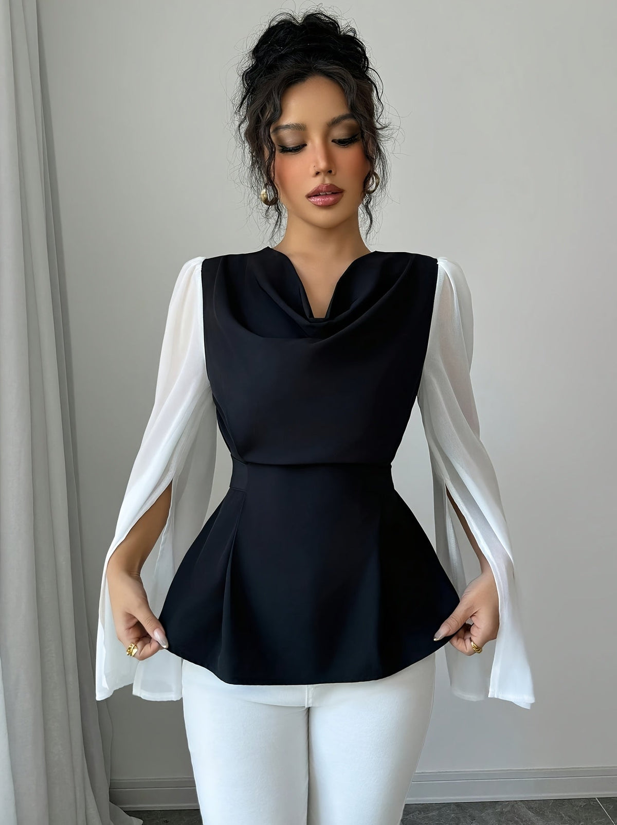 Black and white pleated asymmetrical long sleeve blouse for women, stylish SHOWLU FASHION STORE top with unique design details.