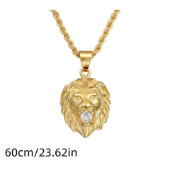 A gold-toned lion head pendant necklace featuring a clear cubic zirconia stone in its mouth.