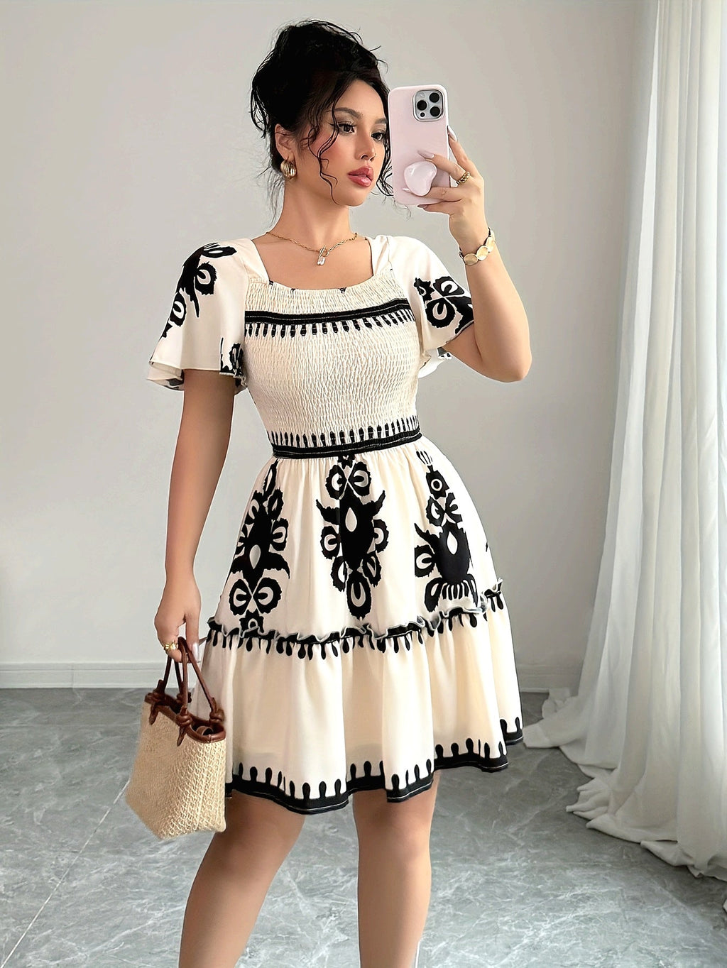 SHOWLU FASHION square neck mini dress with printed A-line pleated design, featuring a stylish and feminine silhouette.
