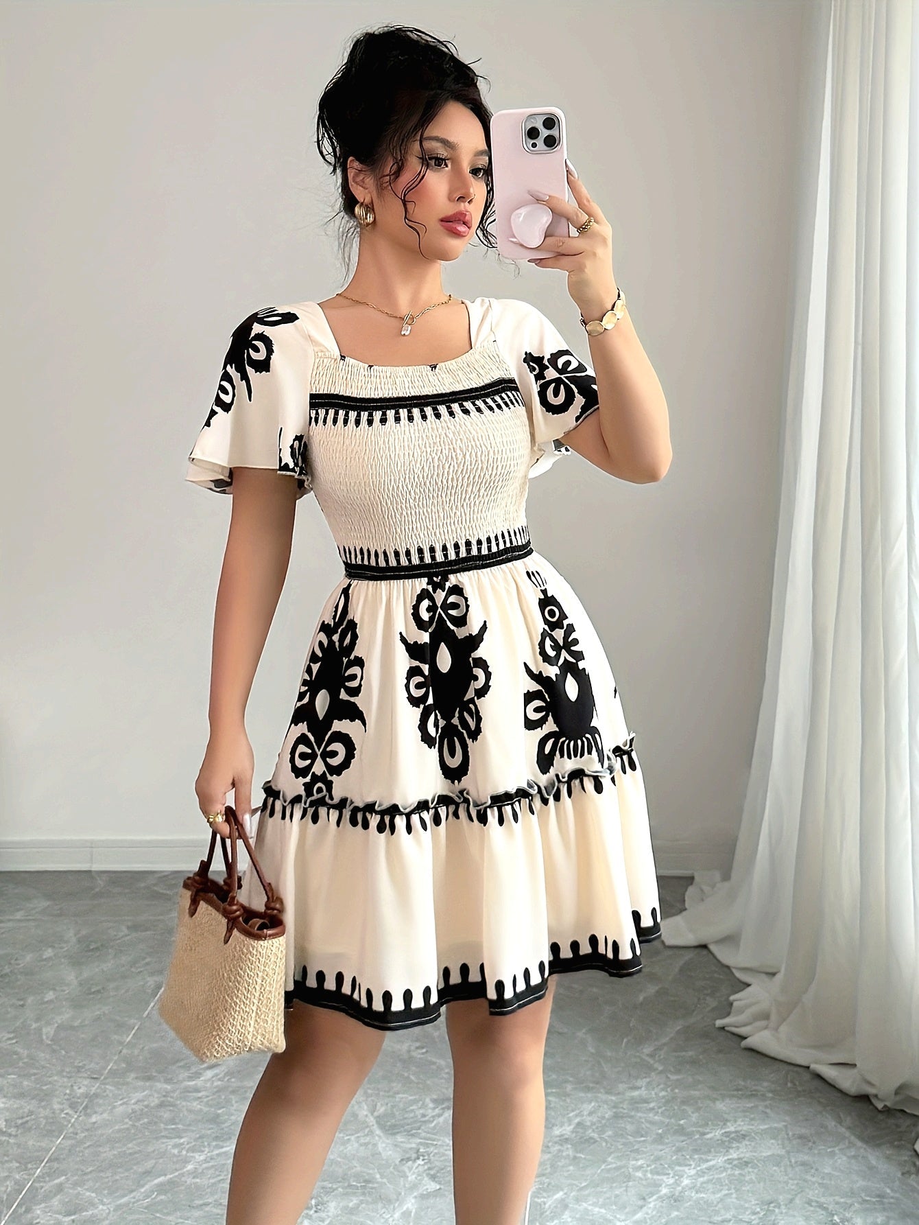 SHOWLU FASHION square neck mini dress with printed A-line pleated design, featuring a stylish and feminine silhouette.