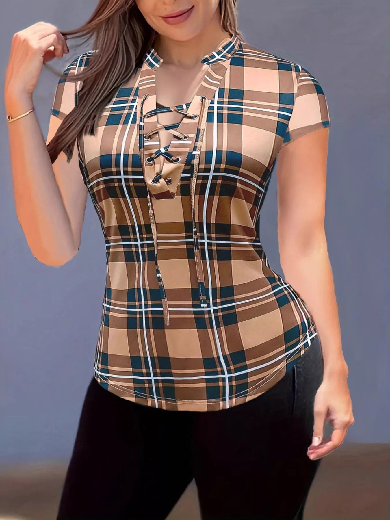 Plaid lace-up short sleeve blouse by Trendsi featuring a stylish design and button-up front.