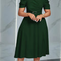 Red women's V-neck ruffle swing dress by SHOWLU FASHION, featuring a belted polyester design and flowing silhouette.