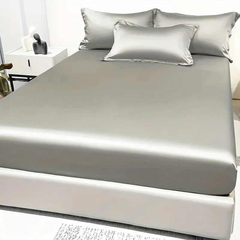 Showlu Fashion satin fitted sheet in solid ice silk color, modern bedding for a stylish bedroom decor.