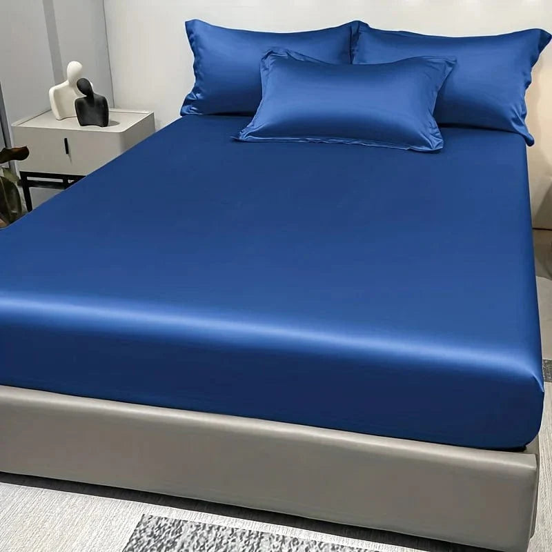 Showlu Fashion satin fitted sheet in solid ice silk color, modern bedding for a sleek bedroom look.