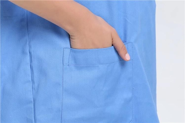 Showlu 100% cotton unisex nursing uniform with V-neck medical scrubs set for hospital nurses and doctors.