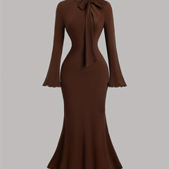 Elegant Long-Sleeve Mermaid Dress with a High Collar And Bow Tie, Fitted for Gatherings And Accentuating Curves.