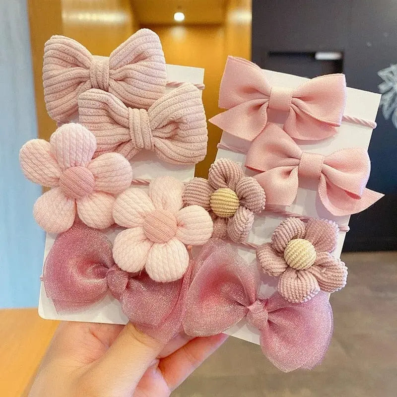 Set of 10 big bow flower elastic hairbands for girls and kids, colorful and cute hair accessories with rubber bands.