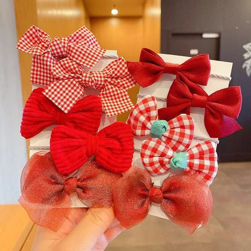Set of 10 colorful big bow flower elastic hairbands for girls and kids, featuring cute and stylish hair accessories.
