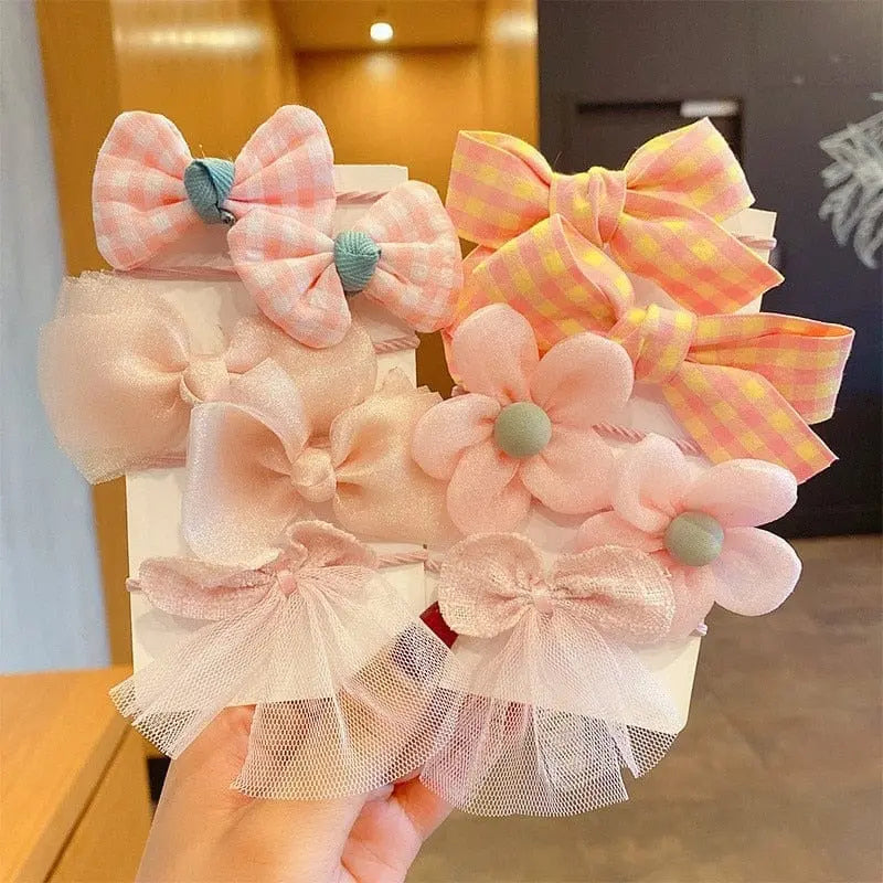 Set of 10 colorful big bow flower elastic hairbands for girls and kids, featuring sweet headbands and hair accessories.